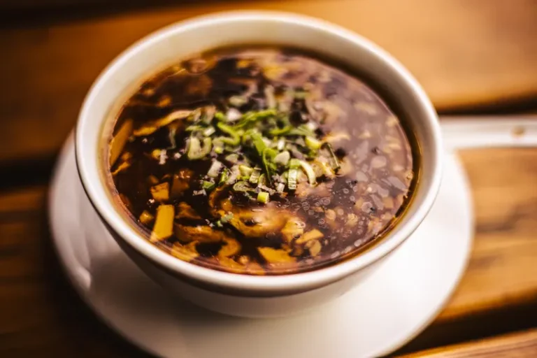 Hot and sour soup in a white cup
