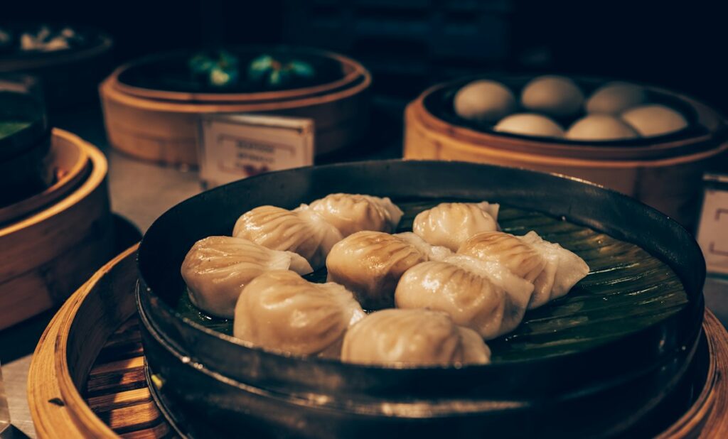 Steamed dumplings in a bamboo steamer