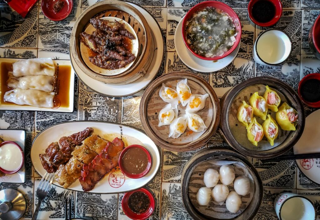 Cantonese dishes on a table, seen from above