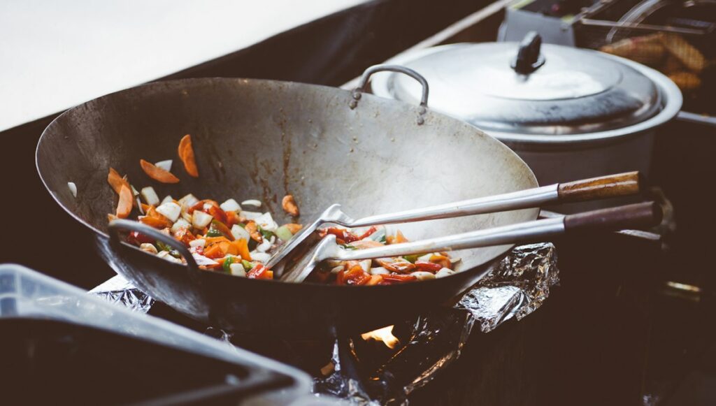 Vegetables stir frying in a wok